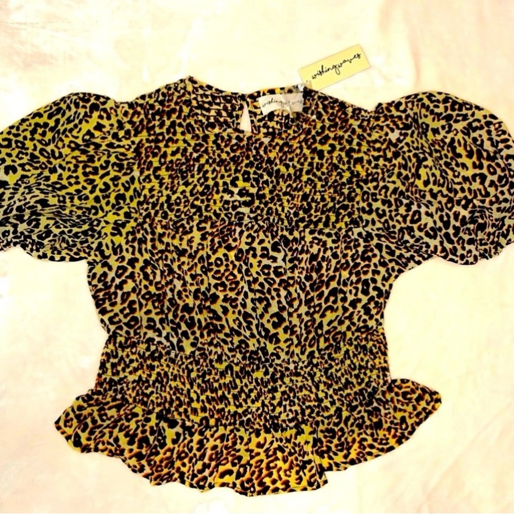 Nwt cheetah mid length sleeved top